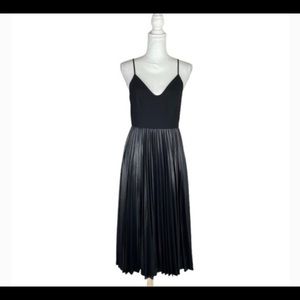 Black pleated (accordion) dress by Halston